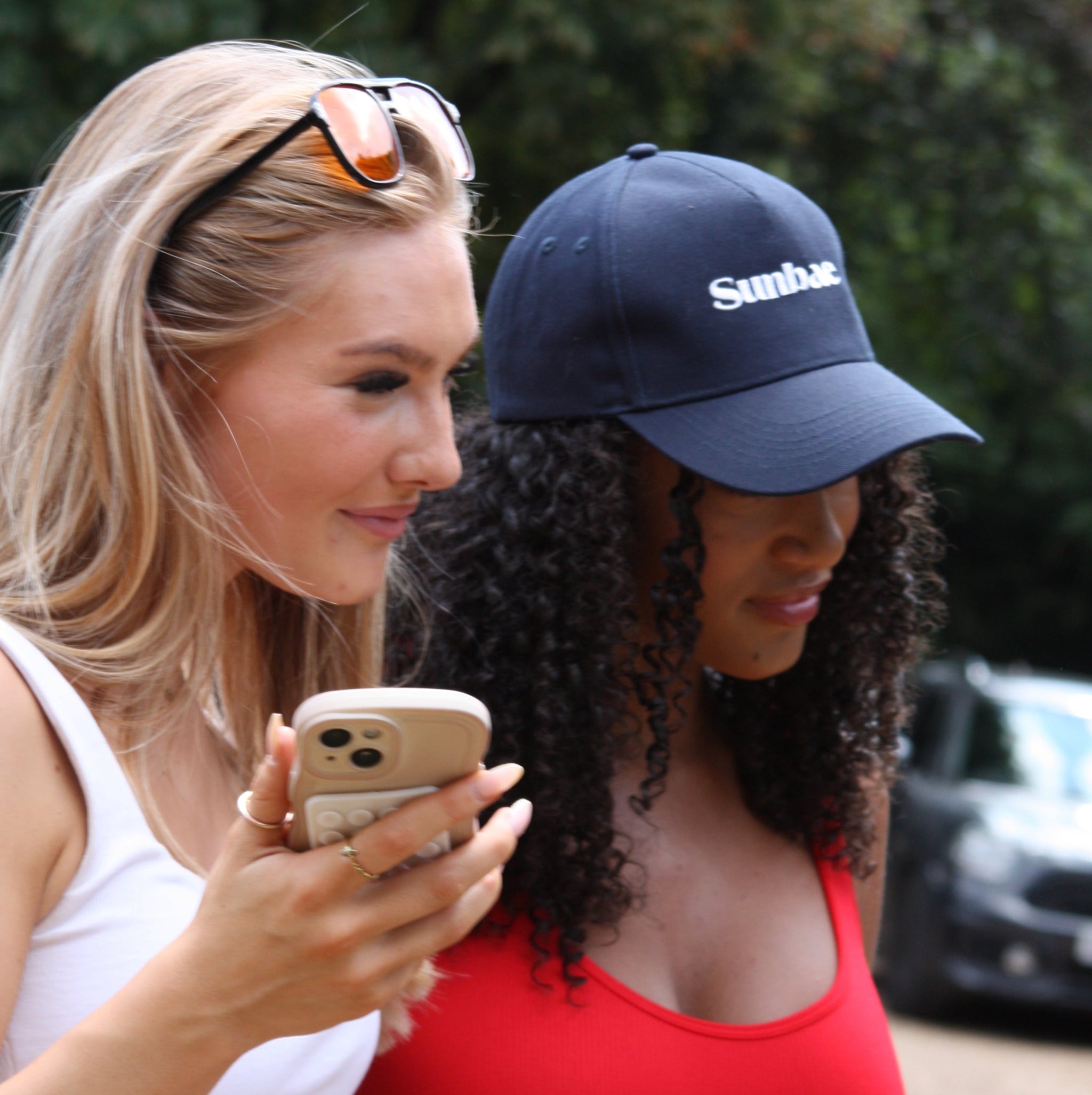 Sunbae Glow Collective wearing Sunbae Solar Cap